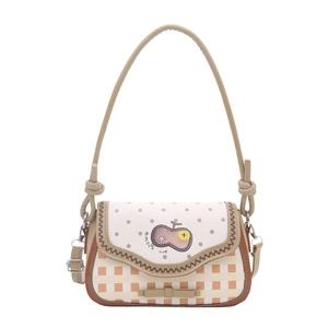 Polka dot and orange checkerboard shoulder bag with apple patch and bow detail