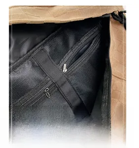 Detail view of large checkered bag featuring a black mesh lining and zippered inner pocket