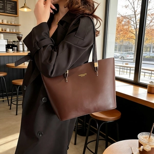 Chic dark brown faux leather tote bag for women with gold hardware and large capacity