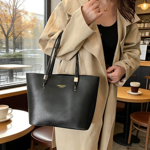 Fashionable black large capacity PU leather tote bag for women with gold logo and straps