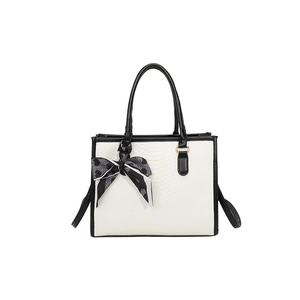 Elegant white snakeskin texture handbag with black contrast trim and heart print scarf