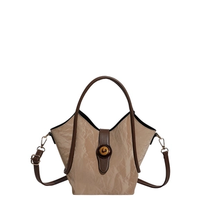 New Chinese style bucket bag in beige textured fabric with brown handles and gold detail