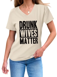 Close-up of beige V-neck cotton T-shirt featuring a vintage Drunk Wives Matter slogan print