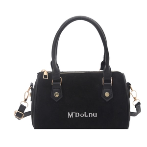 Retro black faux suede Boston bag with double top handles and adjustable shoulder strap
