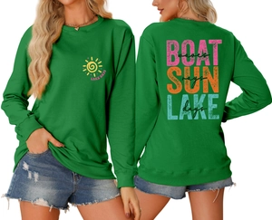 Detail of green round neck sweatshirt showing front logo and back vintage graphic print