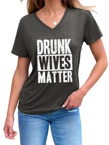 Close-up of Drunk Wives Matter graphic print on dark gray V-neck short sleeve T-shirt