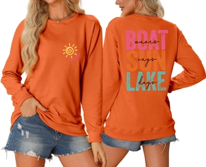 Detail of orange sweatshirt with sun graphic and Boat Sun Lake Waves back print