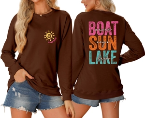 Brown boat sun lake waves sweatshirt featuring front and back graphic prints