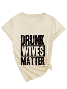 Detail of V-neck T-shirt showing Drunk Wives Matter print and stylish side-knot hem detail