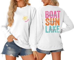 Detail view of white sweatshirt featuring colorful BOAT SUN LAKE WAVES graphic print