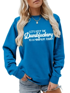 Detail of bright blue crewneck sweatshirt featuring white humor text and ribbed cuffs