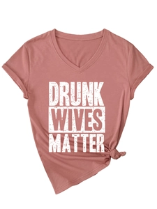 Close-up of V-neck brick red t-shirt with Drunk Wives Matter slogan and side knot