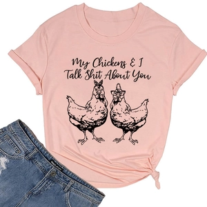 Pink cotton t-shirt detail showing knot hem and humorous graphic with chickens