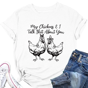 Flat lay of a white crew neck T-shirt featuring funny chicken graphic and sassy text