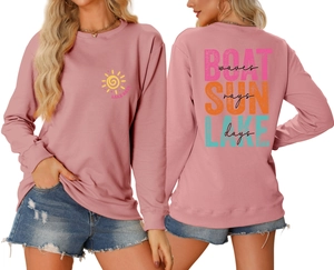 Detailed front and back views of pink Lake Days printed sweatshirt with ribbed cuffs