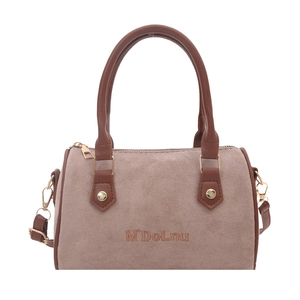 Vintage Boston Boston bag in light brown suede with dark leather handles and crossbody strap