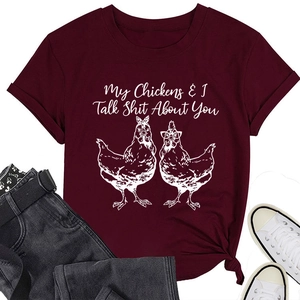 Flat lay of maroon crew neck T-shirt with My Chickens & I Talk Shit About You print