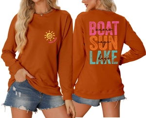 Front and back view of burnt orange sweatshirt with Boat Sun Lake printed design
