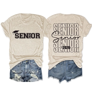 Detail view of Senior 2026 t-shirt with graduation print and ripped denim shorts