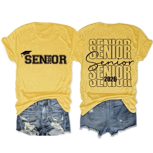 Flat lay of Senior 2026 t-shirt and ripped denim shorts showing front and back design