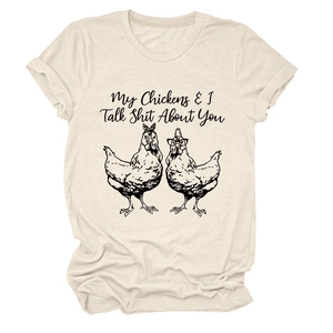 Detail of cream crew neck t-shirt featuring humorous chicken print and quirky text