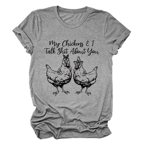 Detail of grey crewneck T-shirt with humorous chickens graphic and funny text slogan