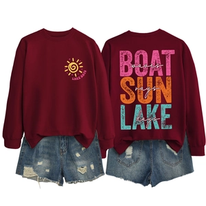 Burgundy Lake Days sweatshirt with back graphic print showing boat sun and waves