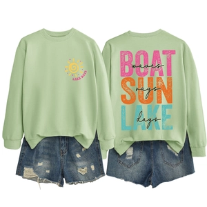 Front and back detail of light green Lake Days sweatshirt with screen printed art