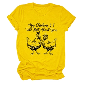 Close-up of yellow cotton t-shirt with My Chickens and I Talk Shit About You print