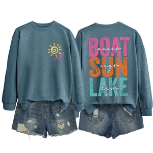 Detailed front and back view of blue Lake Days sweatshirt and distressed denim shorts