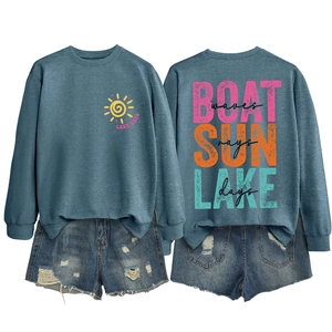 Detail of blue Boat Sun Lake sweatshirt back print and distressed denim shorts