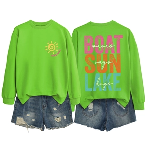Detailed front and back view of fluorescent green lake days sweatshirt and denim shorts
