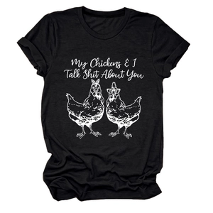Close-up of funny chicken illustration and text print on black cotton t-shirt