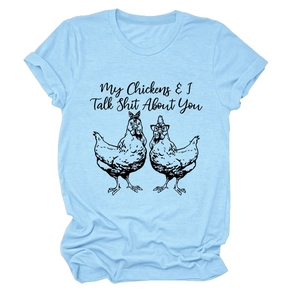 Flat lay of light blue cotton T-shirt featuring funny chicken graphic and quote print