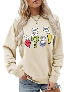 Detail of beige crewneck sweatshirt with cute cartoon graphic and text prints