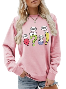 Detailed view of pink sweatshirt featuring cute cartoon punctuation and comic text print
