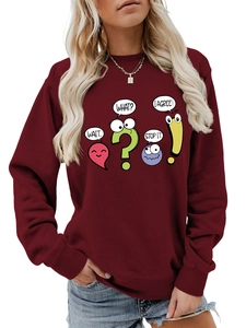 Close-up of wine red sweatshirt with colorful cartoon emojis and funny text bubbles