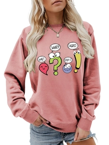 Detail of dusty pink sweatshirt featuring quirky cartoon graphic icons and speech bubbles