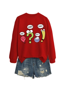 Detail of red crewneck sweatshirt with cartoon graphics and distressed blue denim shorts