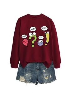 Detail of burgundy sweatshirt with quirky text prints and distressed denim shorts