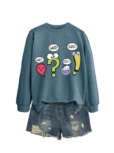 Blue-gray sweatshirt with cartoon punctuation print and distressed denim shorts detail