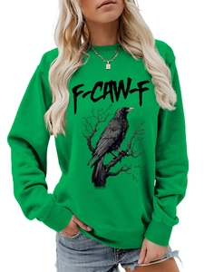 Dettaglio felpa verde brillante con stampa di corvo nero e scritte F-CAW-F sul petto