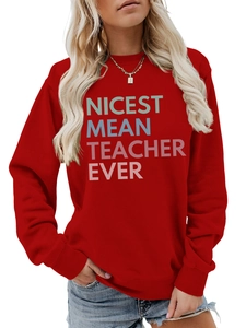 Detail of red crewneck sweatshirt featuring Nicest Mean Teacher Ever colorful text