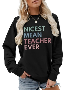 Close-up of Nicest Mean Teacher Ever colorful lettering on black crewneck sweatshirt