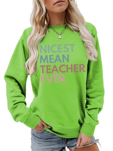 Detail of the green crewneck sweatshirt featuring the Nicest Mean Teacher Ever print