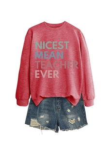 Flat lay of a red long sleeve sweatshirt with colorful Nicest Mean Teacher Ever print