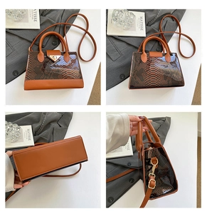 Detail shots of brown snakeskin embossed leather handbag with gold metal clasp and strap