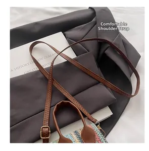 Close-up of the comfortable leather shoulder strap and woven texture on a boho crossbody bag