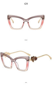 Detail view of cat eye glasses with gradient frame and heart-shaped temple accents