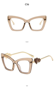 Cat eye glasses frame with heart-shaped metal accents and translucent brown resin